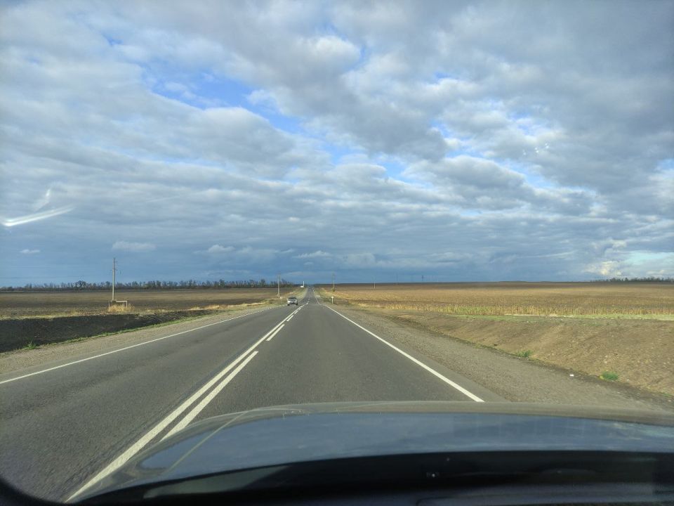 Председатель Правительства РФ Михаил Мишустин открыл в режиме ВКС обновленный участок трассы Донецк - Новоазовск - Седово на площадке выставки «Траспорт России»