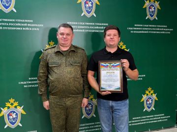 Корреспондента МИЦ "Известия" Евгения Быковского наградили за раскрытие специфики работы офицеров органов СК России в условиях СВО