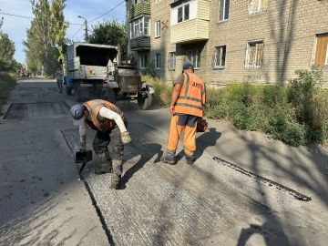 Ремонт дорожного покрытия по ул.Жмуры Киевский район